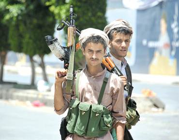 مسلحين بالزي المدني (بلاطجة) يدعمهم نظام صالح -أرشيف-