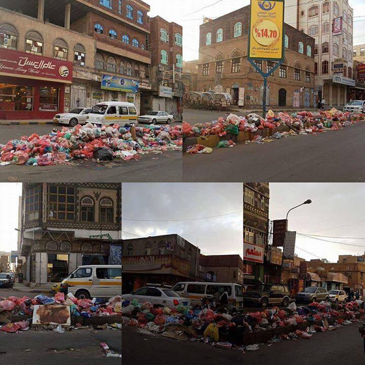 بالصور : قيادات انصار الله في صنعاء تنهب رواتب عمال النظافة وتُغرق المدينة بالقمامة المكدسة