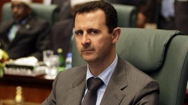 الأسد يرد على دعوة كيري للحوار في سوريا