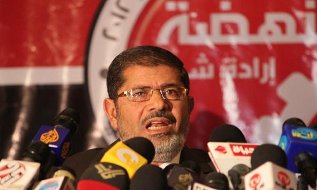 ادعاءات متضاربة بالفوز بين مرسي وشفيق ولجنة الانتخابات تعلن النتيجة الخميس 