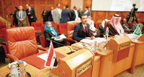 كرسي سوريا شاغرا أثناء اجتماع اللجنة الوزارية الملكفة بالملف الس