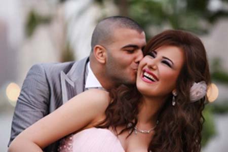 نادي الأهلي المصري يوافق على زفاف متعب وملكة جمال مصر