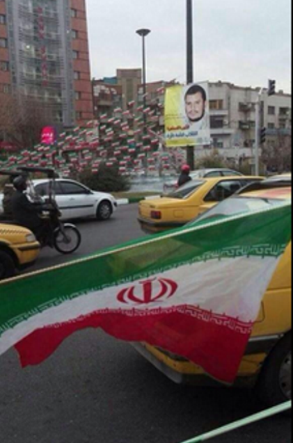 شاهد صور عبد الملك الحوثي في شوارع طهران