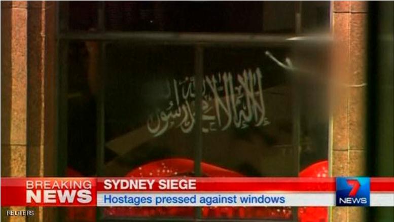 عنصر من داعش يحتجز عشرات الرهائن في مقهى بمدينة سيدني بأستراليا والحكومة تعلن حالة الطوارئ في المدينة