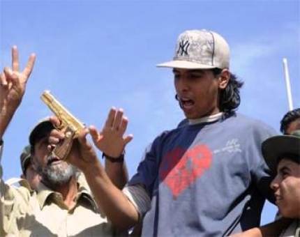صورة الشاب أحمد الشيباني الذي قتل القذافي