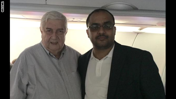 قيادي بحزب صالح مع وزير الخارجية السوري وليد المعلم - إرشيف
