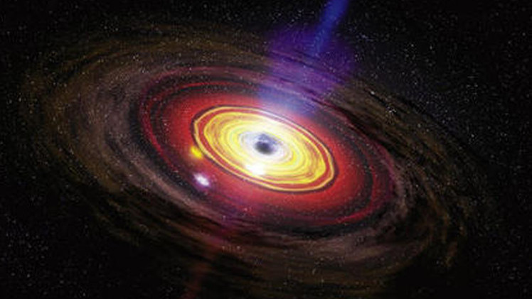 علماء الفلك يرصدون ثقبا أسود يمزق نجوما